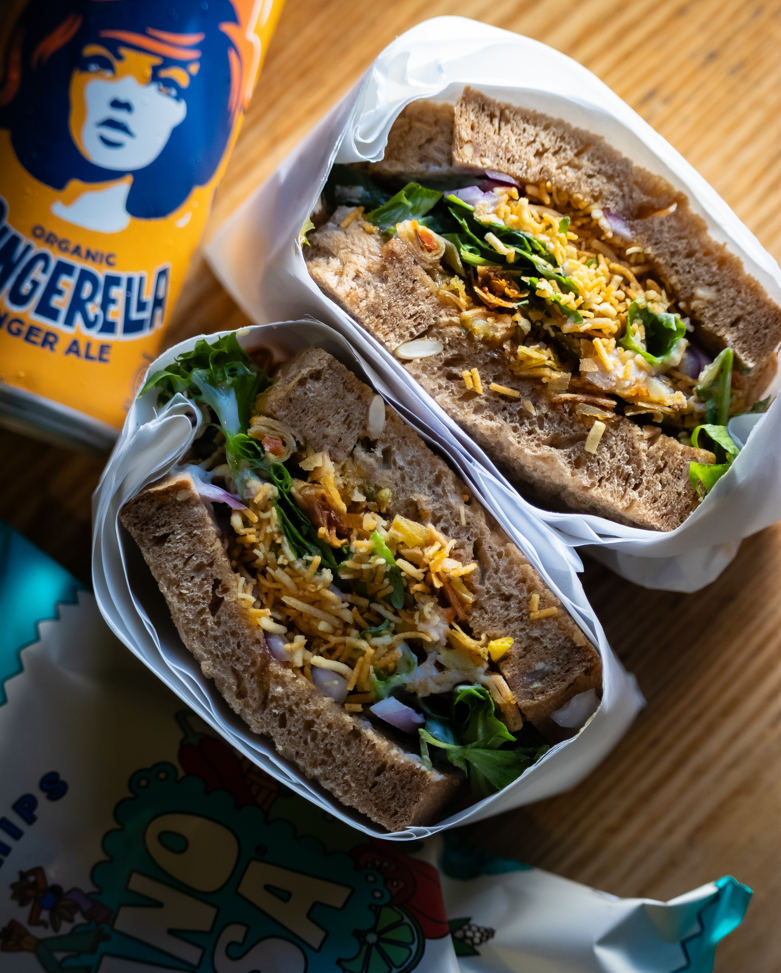Sandwich, drink and crisps